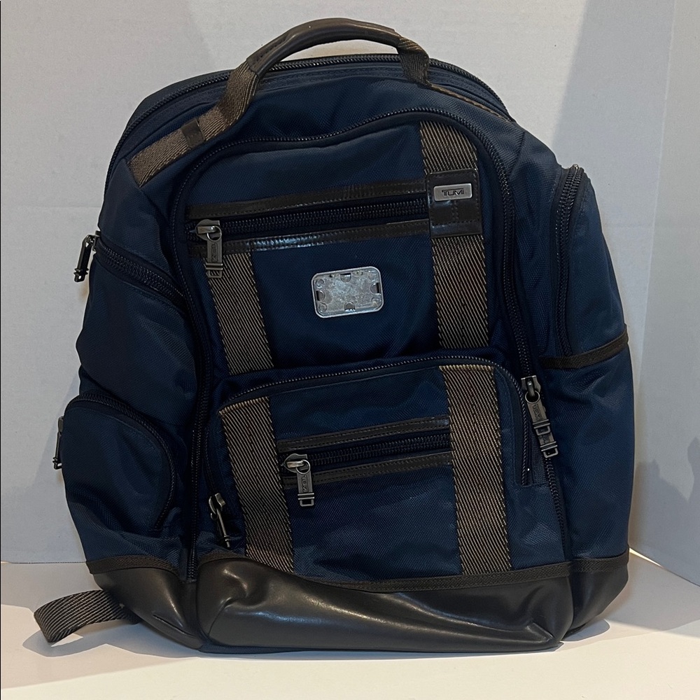 Tumi Navy and Brown Multi-Pocket Backpack